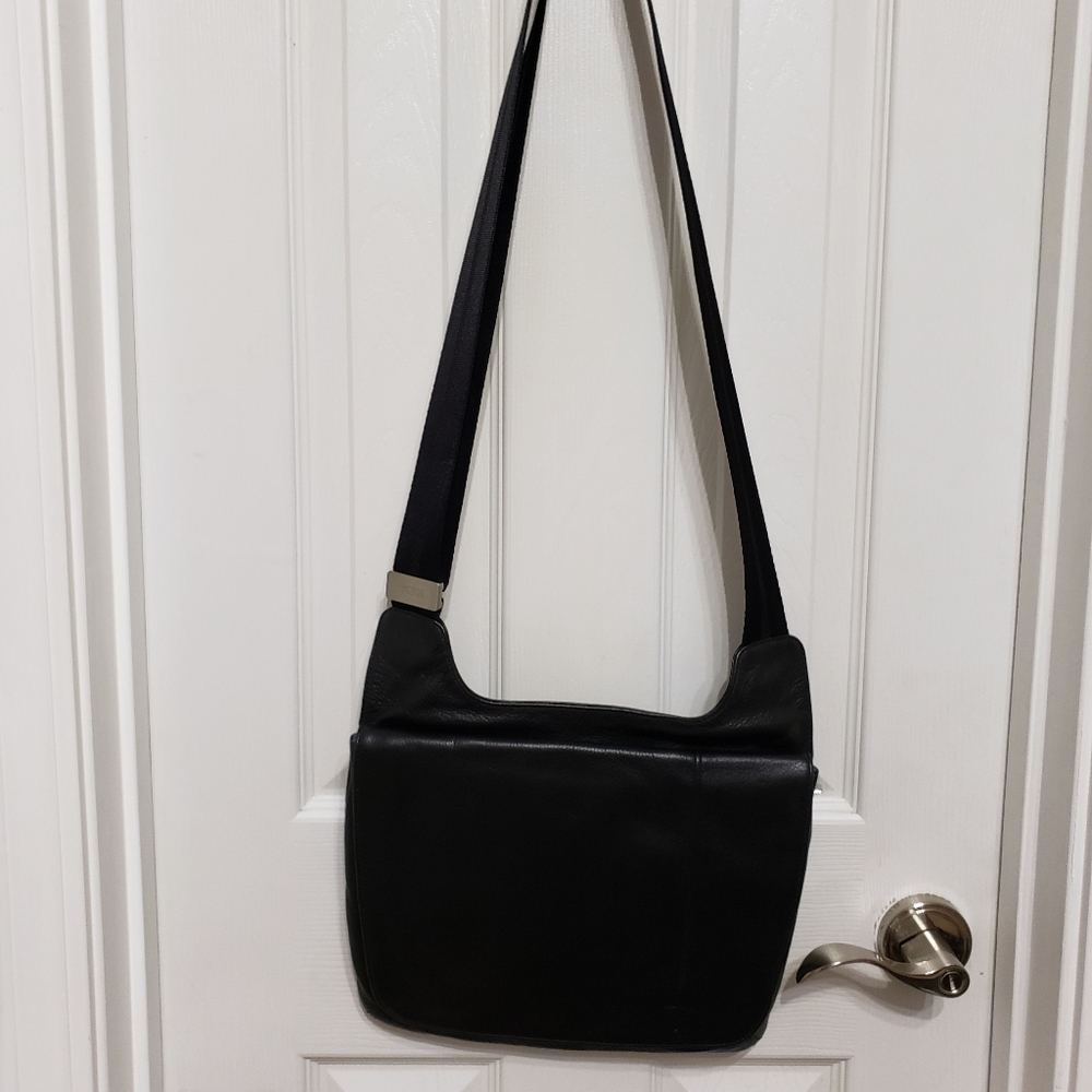 TUMI all leather crossbody